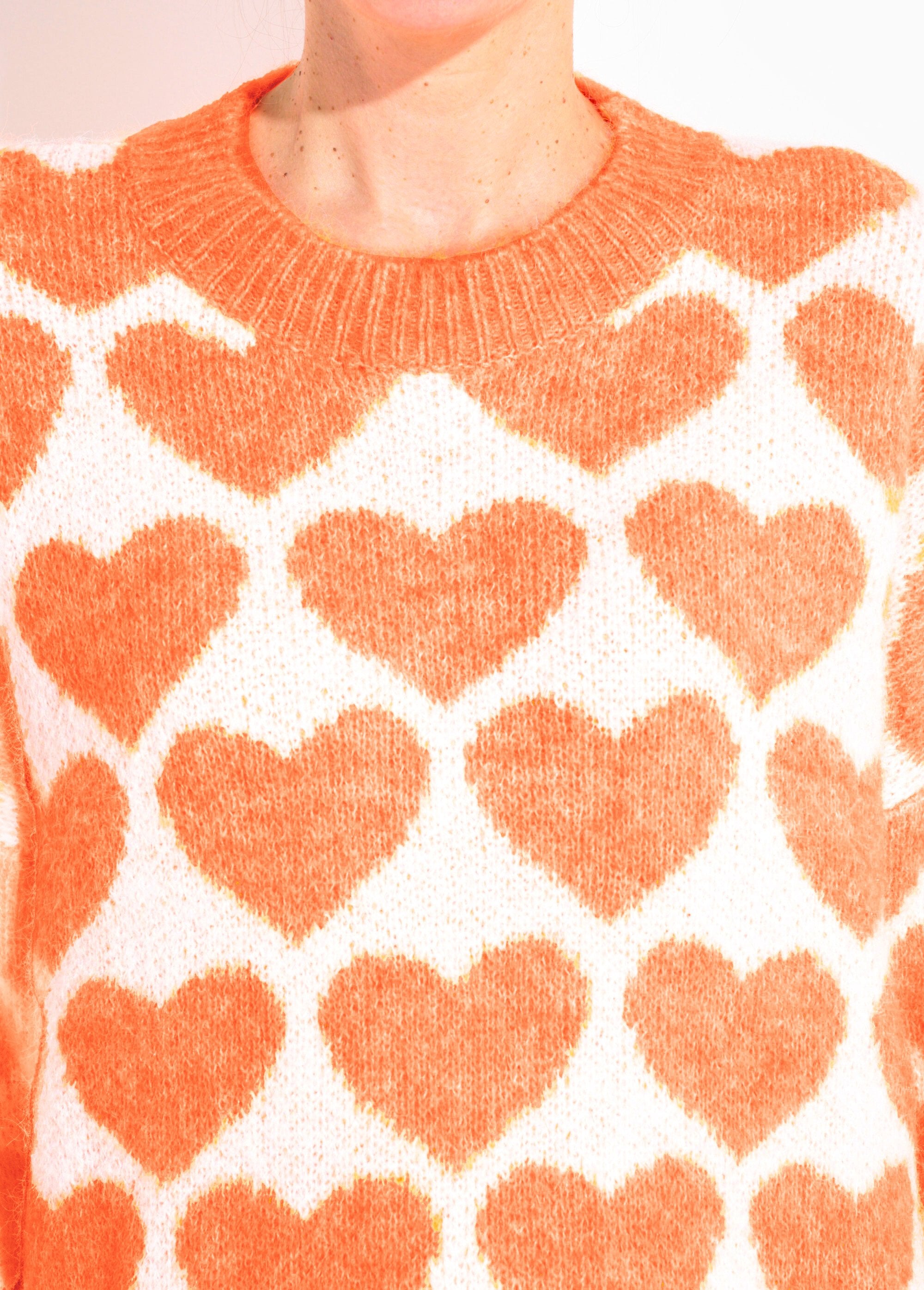 Warm_knit_sweater_with_wool_and_heart_patterns_Bright_orange_DE1_slim